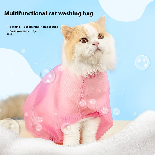 Cat calmly sitting in the pink Calm Groom mesh bath bag