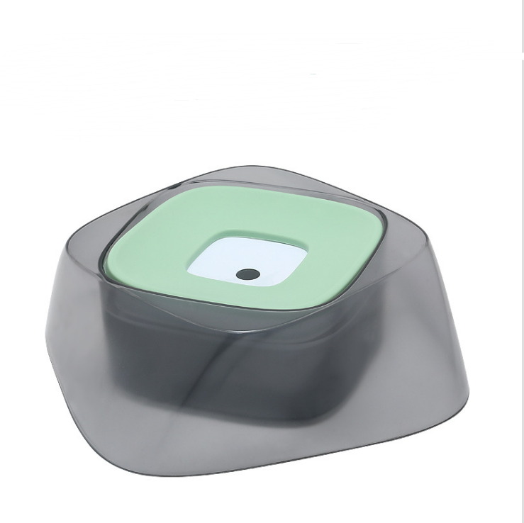 Splashguard no-spill bowl with green floating disk