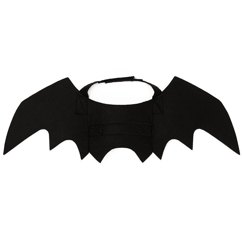 The felt bat wings laid flat, showing the elastic neck loop and reinforced chest strap