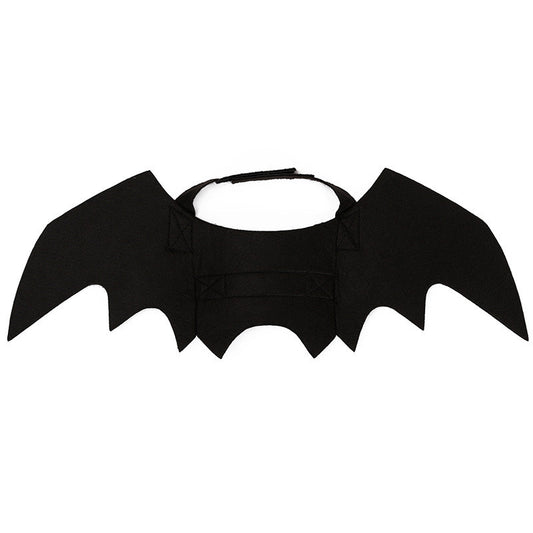 The felt bat wings laid flat, showing the elastic neck loop and reinforced chest strap
