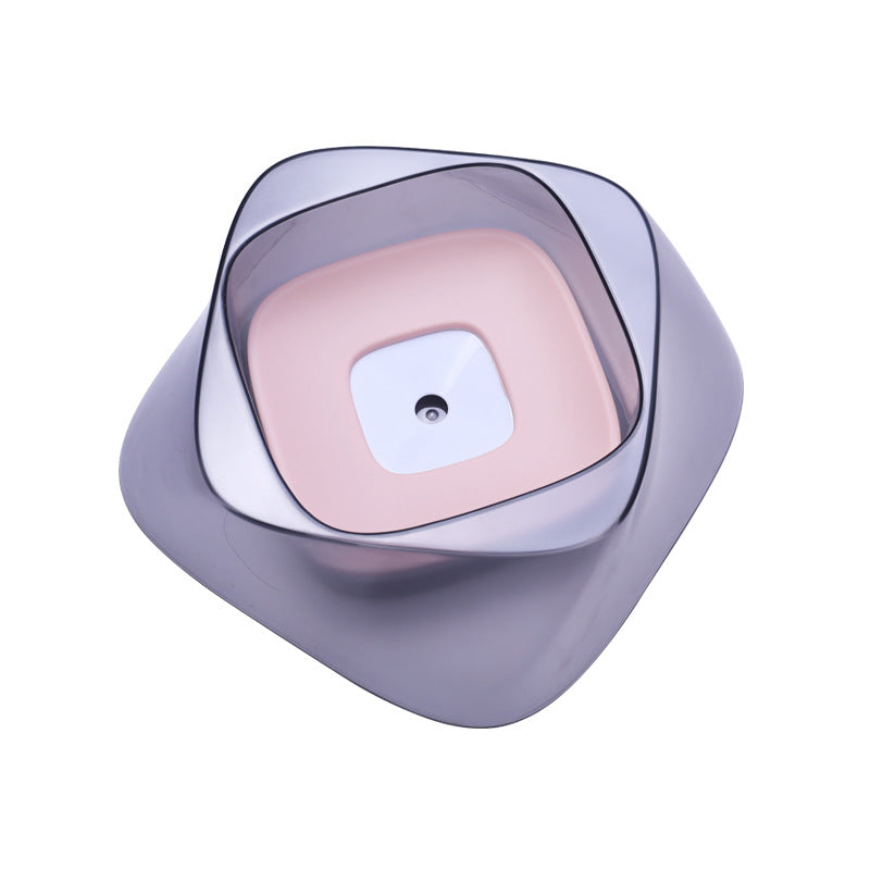 Cat drinking from the no-spill bowl with pink floating disk